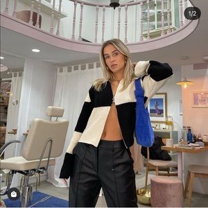 Double zip sweater from Source Unknown. One Size